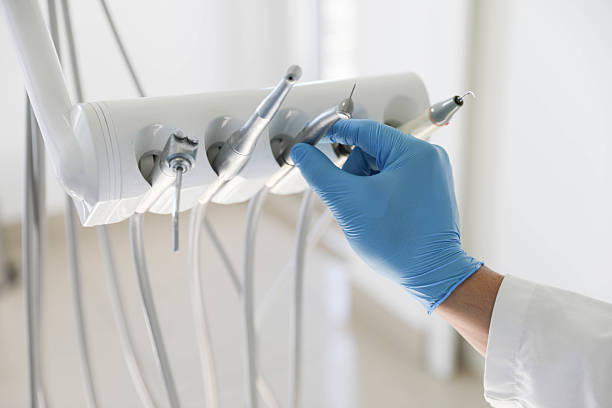 Professional Tooth Extraction technician working in Lake Station, IN